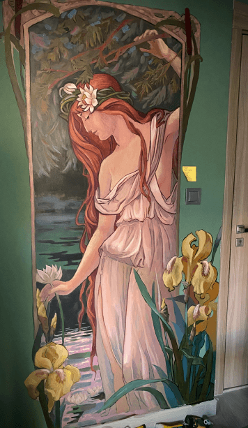 Art Nouveau-inspired mural of a woman surrounded by flowers
