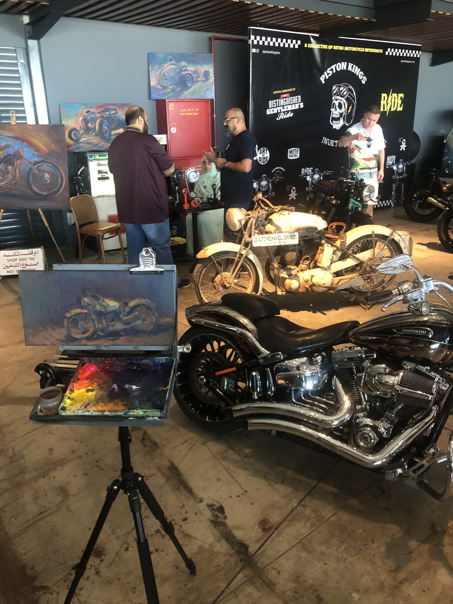 Painting station beside motorcycles