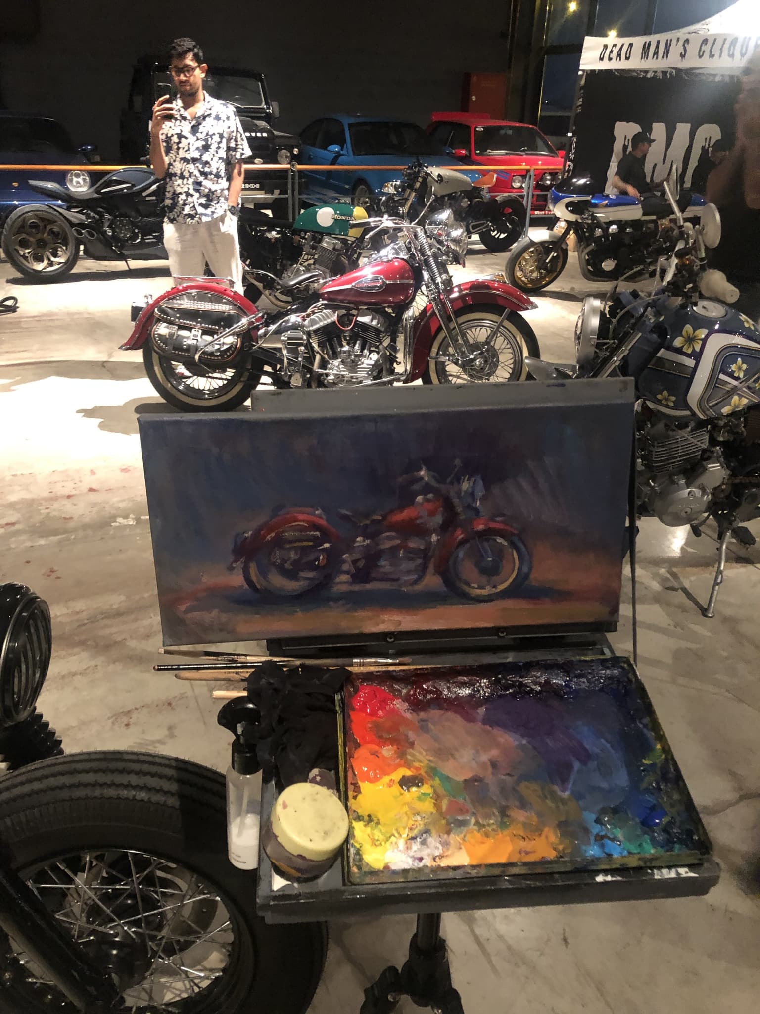Live painting setup among motorcycles