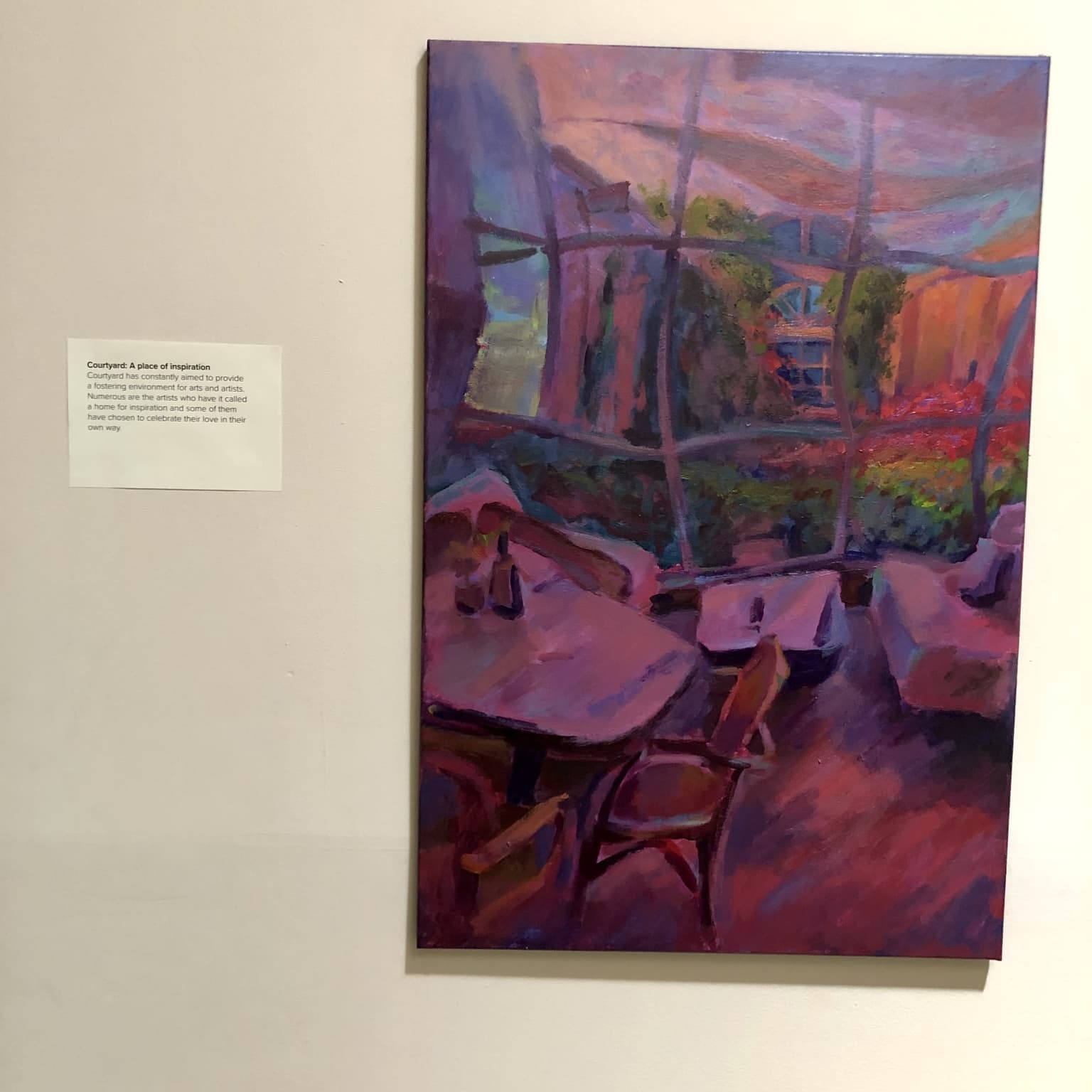 Painting displayed on a gallery wall