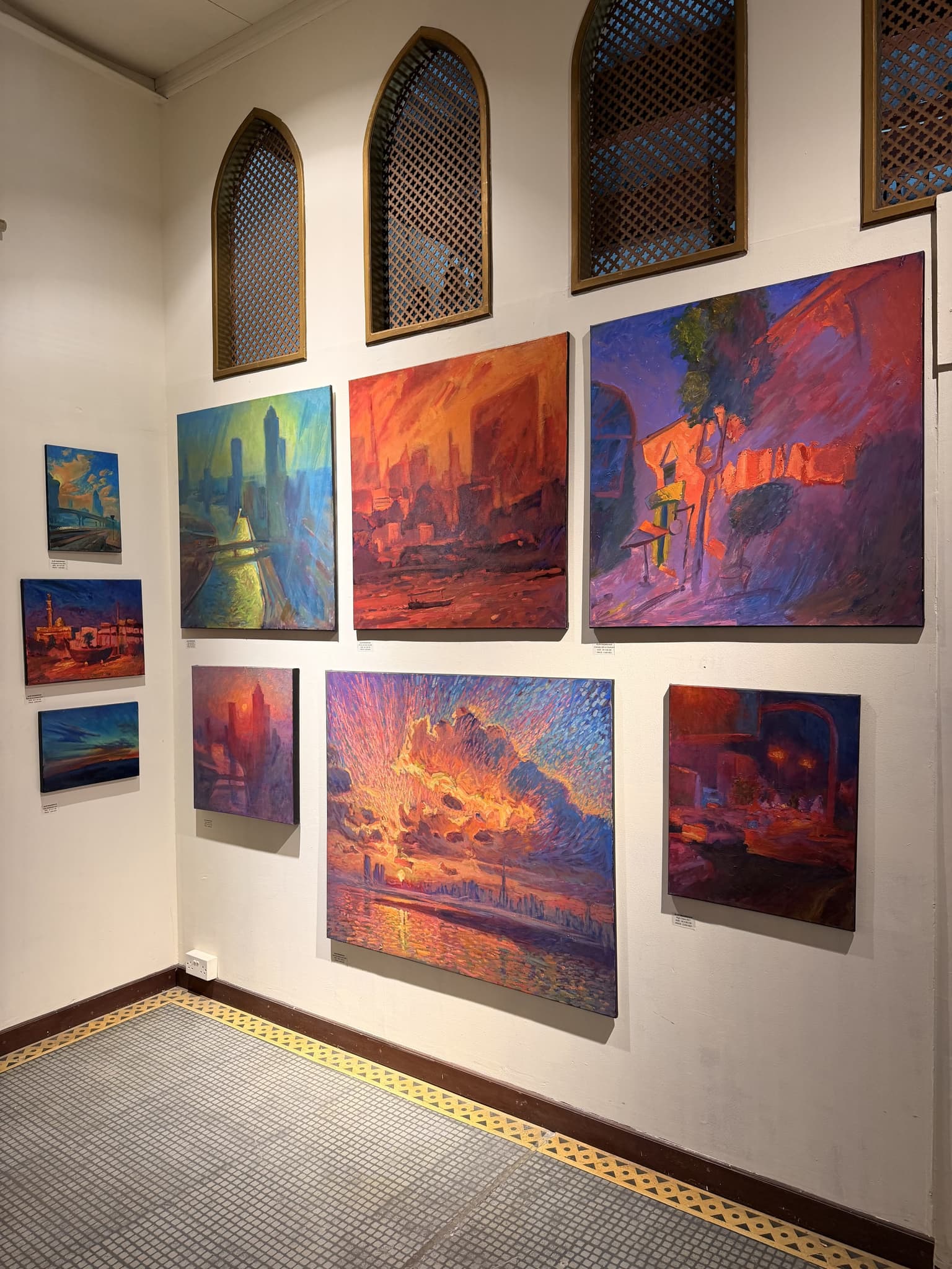 Paintings installed together in an exhibition